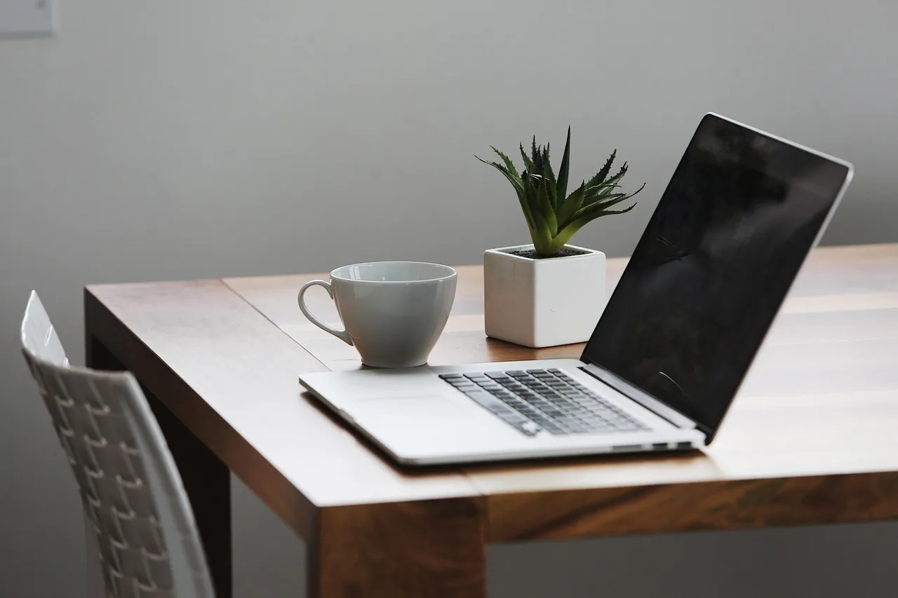 laptop, macbook, computer, business, office, desk, table, coffee, cup, mug, gray business, gray computer, gray office, gray coffee, gray laptop, gray table, gray desk, coffee cup, gray company, gray cup. Chicago agency marketing ops compared with in-house teams