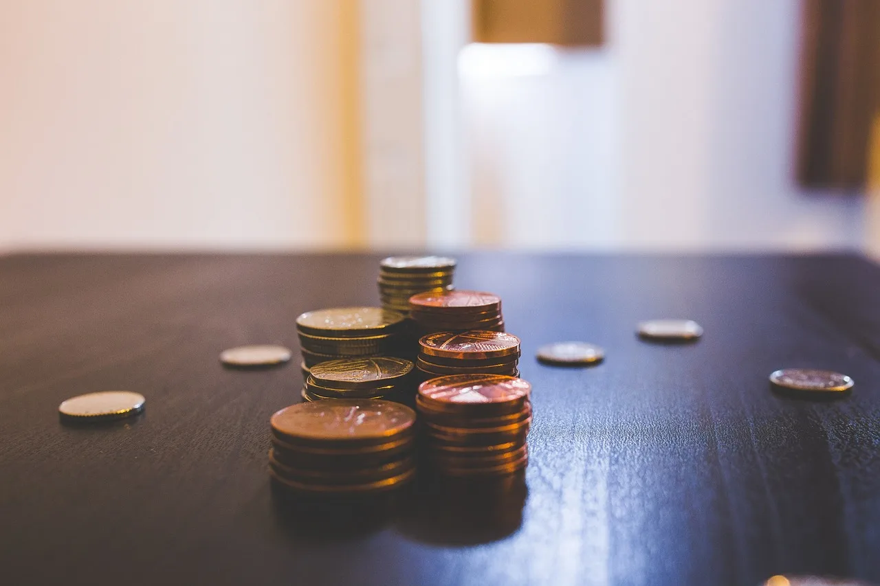 blur, bronze, coins, color, currency, indoors, money, stack of coins, table. Canadian budget ranges for marketing workflow automation, line by line